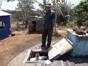 Guillermito inspecting the water system.
