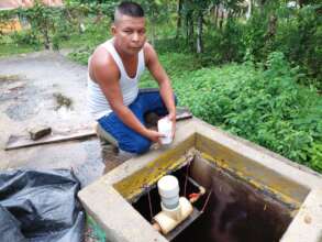 Plumber installing the chlorine tablets