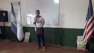 Carmen sharing with others CAPS at a training