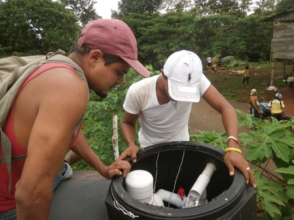 Jairo installing the new CTI-8 system in the tank