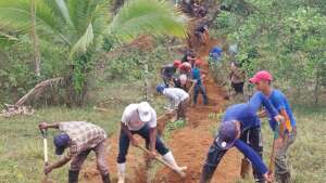 The population digging trenches from water source