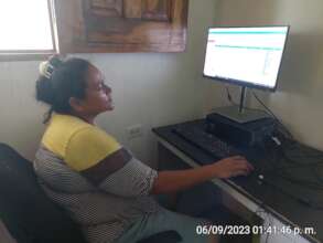 Tita working on her statatistic