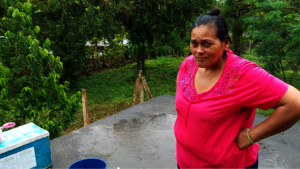 Tita supervising the storage water tank