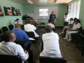 SHI staff educating visitors about clean water