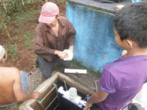 Fredy installing the chlorinator last fall.