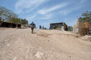 The group walks into Khan al Ahmar