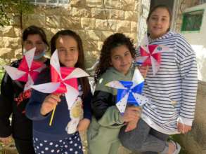 Children at Madaa Creative Center make Pinwheels