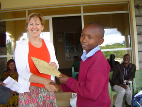 Well done! Jean cogratulates a student.
