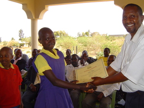 Well done! A student recieves a certificate