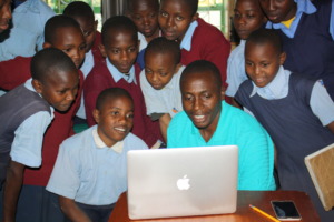 Students at the LRC with teacher Patrick