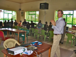 Luke from Karibu Center with students at the lrc