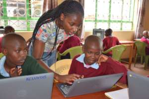 Monicah guides students at the LRC