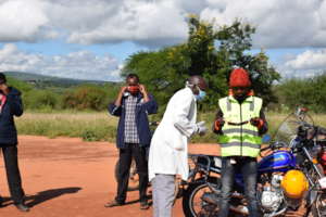 Providing Masks to Boda Boda Drivers