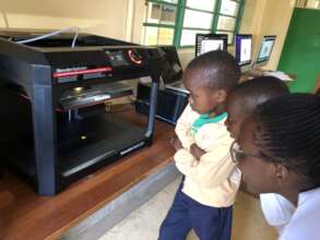 Watching the Designs Print on the 3D Printer