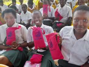 Girls at the Mbaikini HS received Wings Poa Kits!