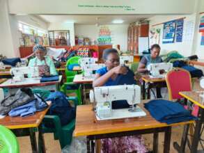 Mothers earn income by making the kits