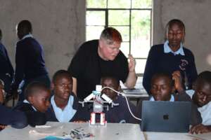 WRO staff guide robotics learners