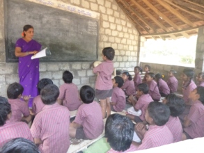 Children are studying in the class room.