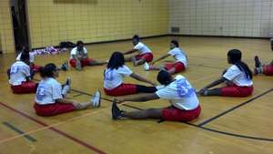 Our girls' basketball champs warming up