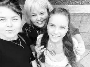 Tetiana Gurska with her biological daughters