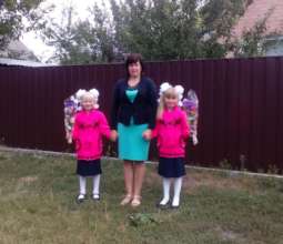 Larysa with Karina and Vika: on the way to school