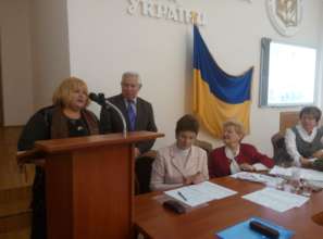 Patronage carer Tetiana Gurska being awarded...