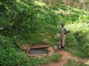The polluted steam where the villagers get water