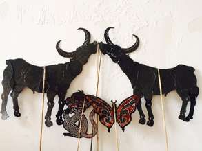 Two buffaloes, a butterfly and a monkey!