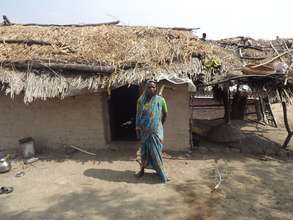 Mrs. Suman Sonaba Pawar in front of her house