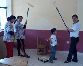 Teachers painting their classrooms