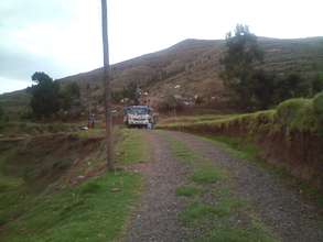 Crane truck the electric co. sends to set posts