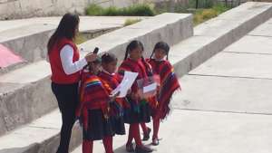 Cusco pride shines in red ponchos and pride poems