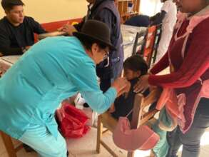 Nurses vaccinate girls Gov childhood vaccine day