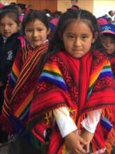 Youngest students showing special off ponchos