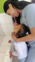 University dental student teach CW girls oral care