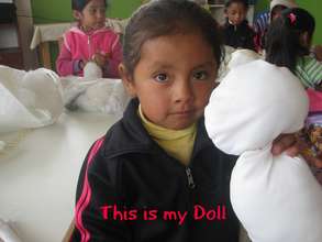 Already she knows HER Doll as is