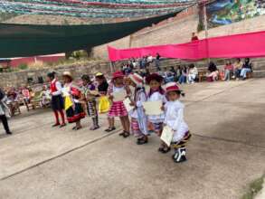These little girls hold their prize-first diploma