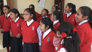 CW girls singing in Quechua for new friends