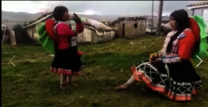 Back in village student recites her poem for mama