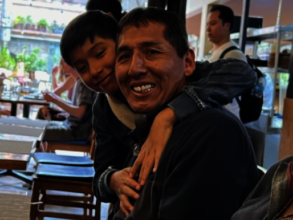 CW board member Efrain Valles and son with group