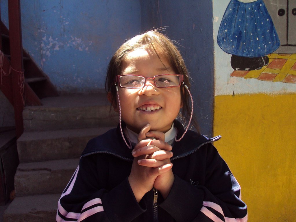 Student is very happy to be able to go to school