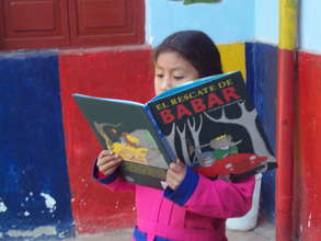 Student reading to assembly of school