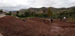 Parent farmers prepare land to plant food