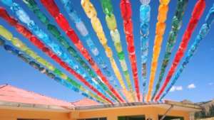 Plastic bottle shade effect over small patio area