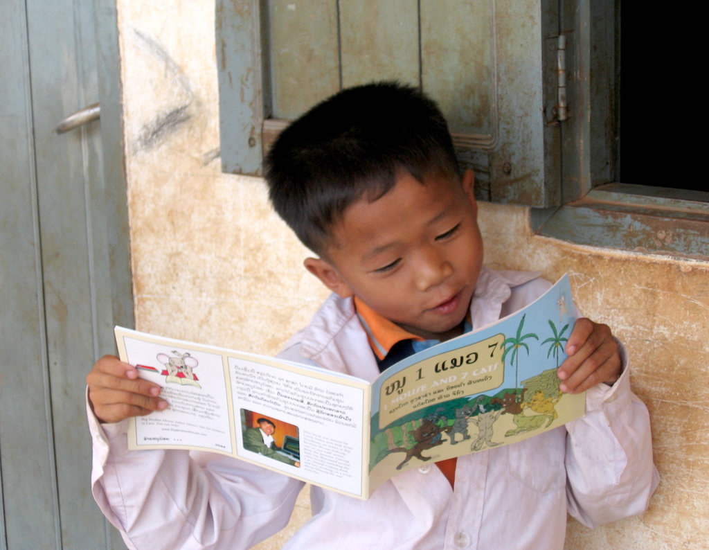 Provide books to children in villages in Laos
