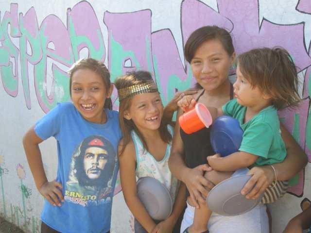 Siblings caring for each other at Club Esperanza!