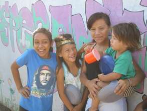 Siblings caring for each other at Club Esperanza!
