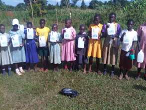 Donating hand washing jerricans to schools