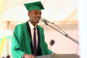 Modeste delivers a speech during the ceremony.