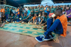 The "children" enjoy a traditional meal.